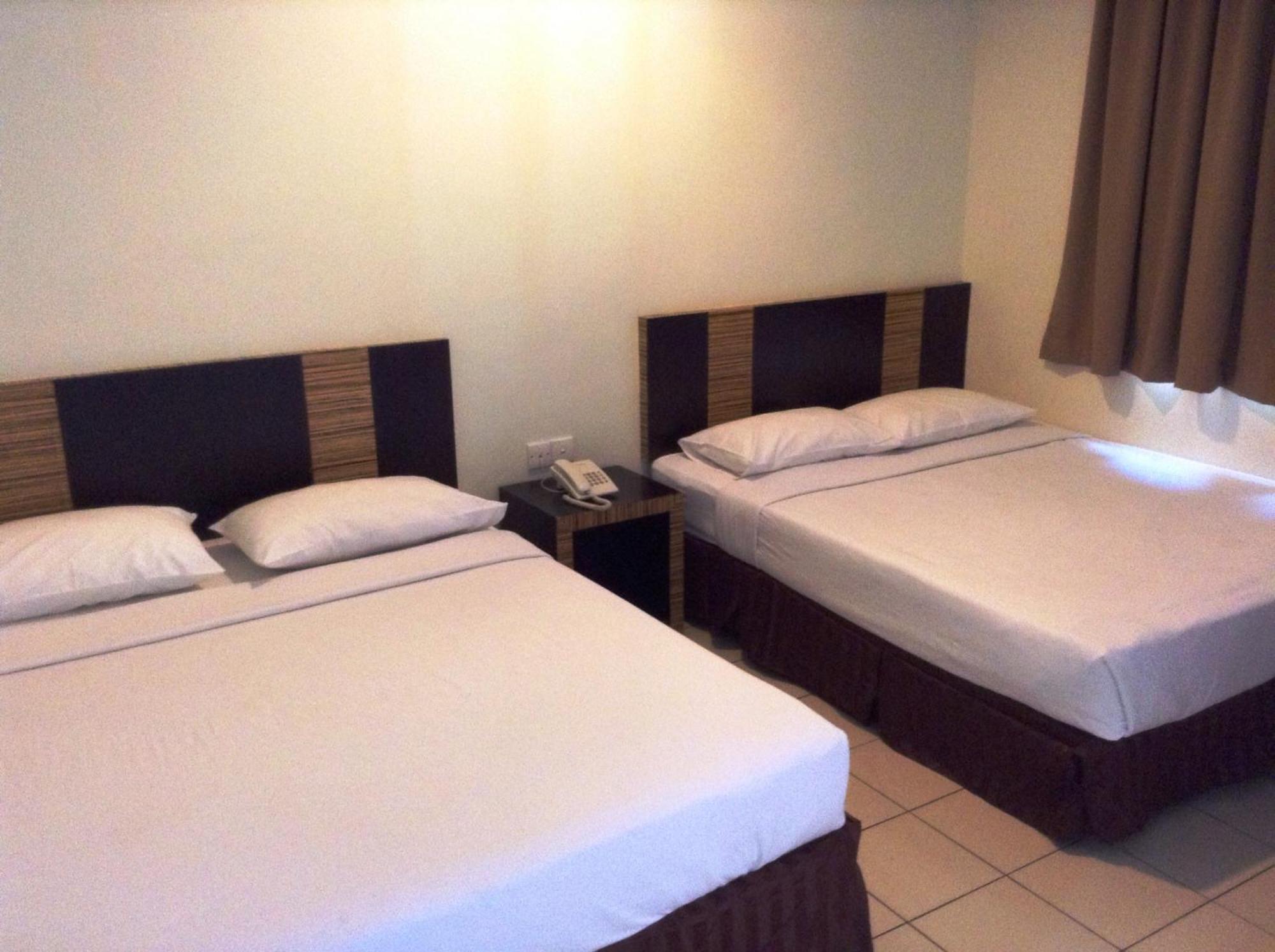 Hotel Traveller Кота-Кинабалу Номер фото