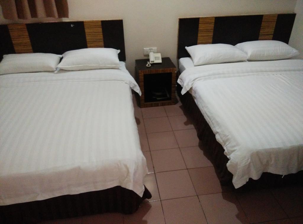 Hotel Traveller Кота-Кинабалу Экстерьер фото