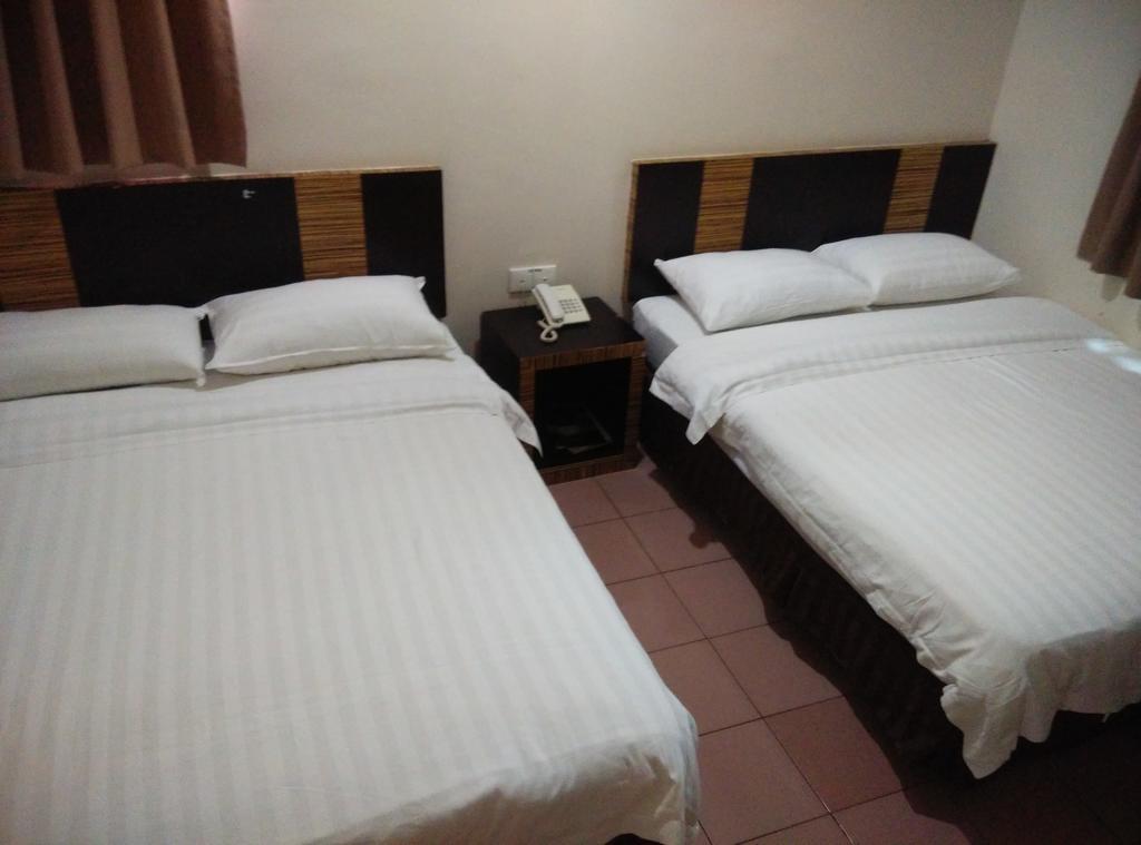 Hotel Traveller Кота-Кинабалу Экстерьер фото
