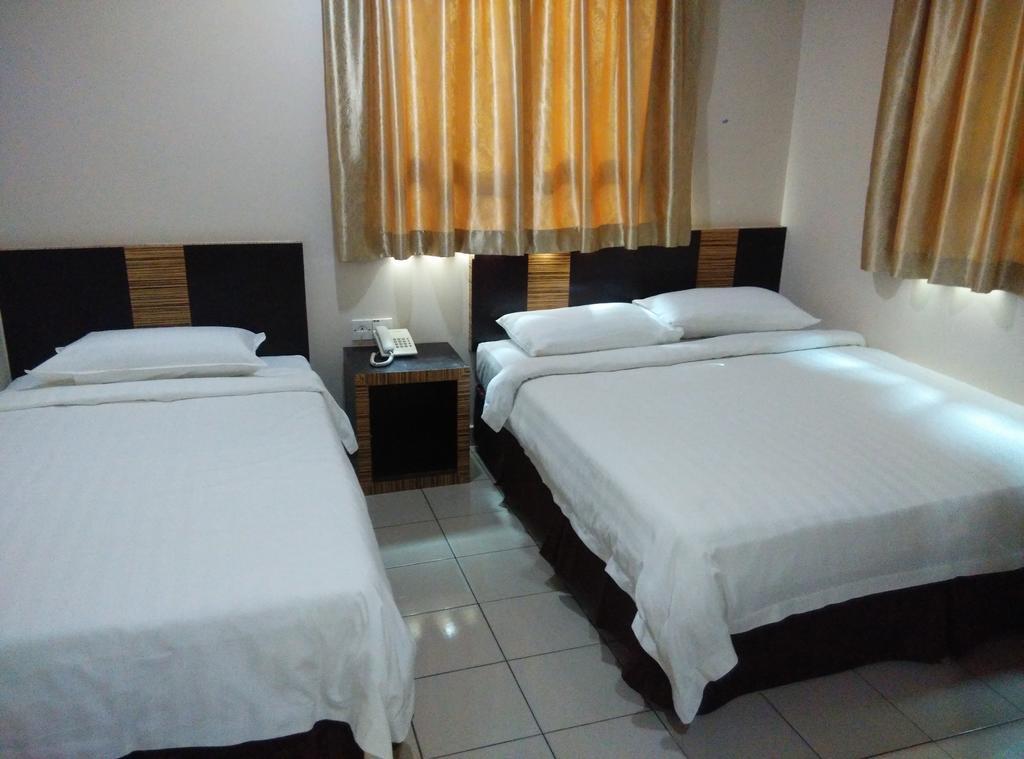 Hotel Traveller Кота-Кинабалу Экстерьер фото