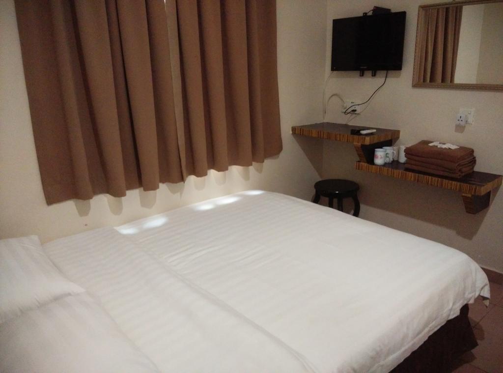 Hotel Traveller Кота-Кинабалу Экстерьер фото