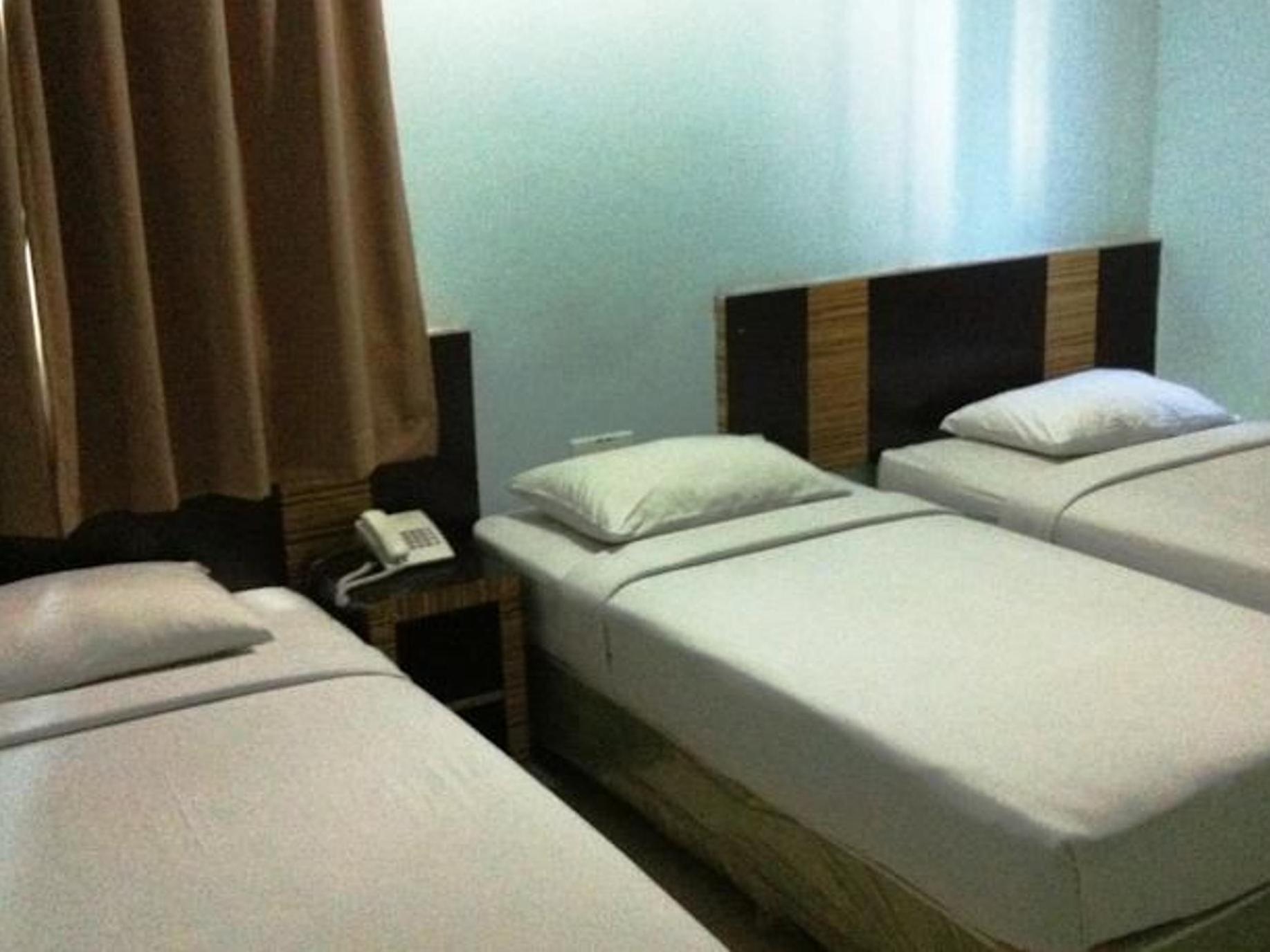Hotel Traveller Кота-Кинабалу Экстерьер фото