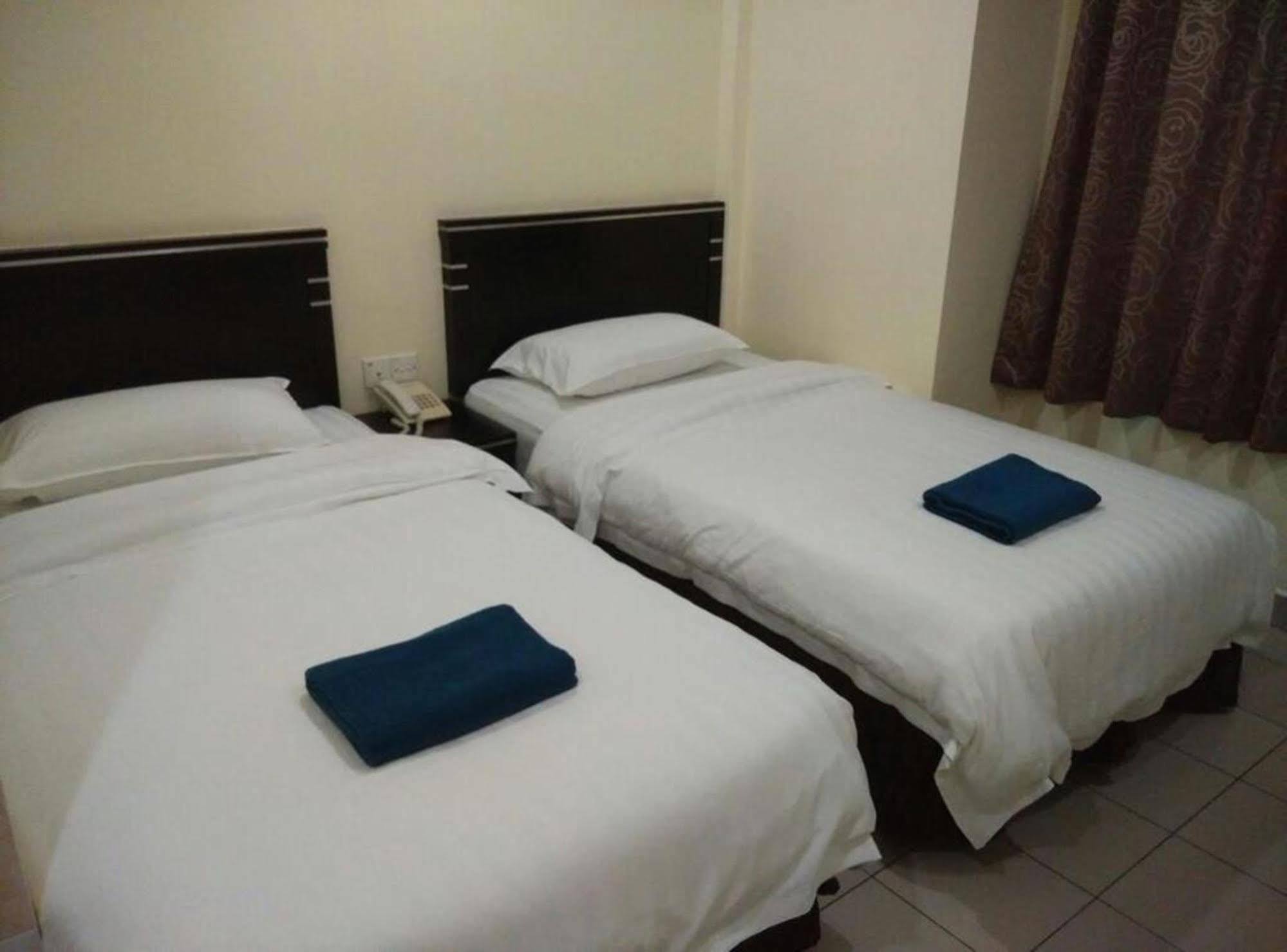 Hotel Traveller Кота-Кинабалу Экстерьер фото