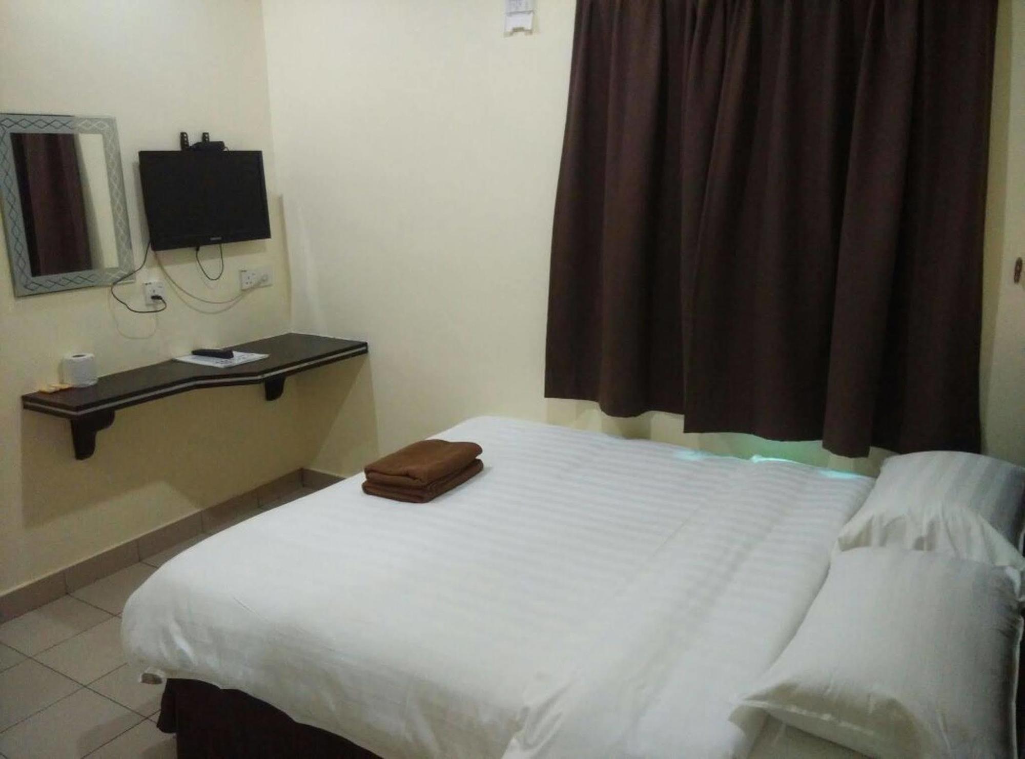 Hotel Traveller Кота-Кинабалу Экстерьер фото